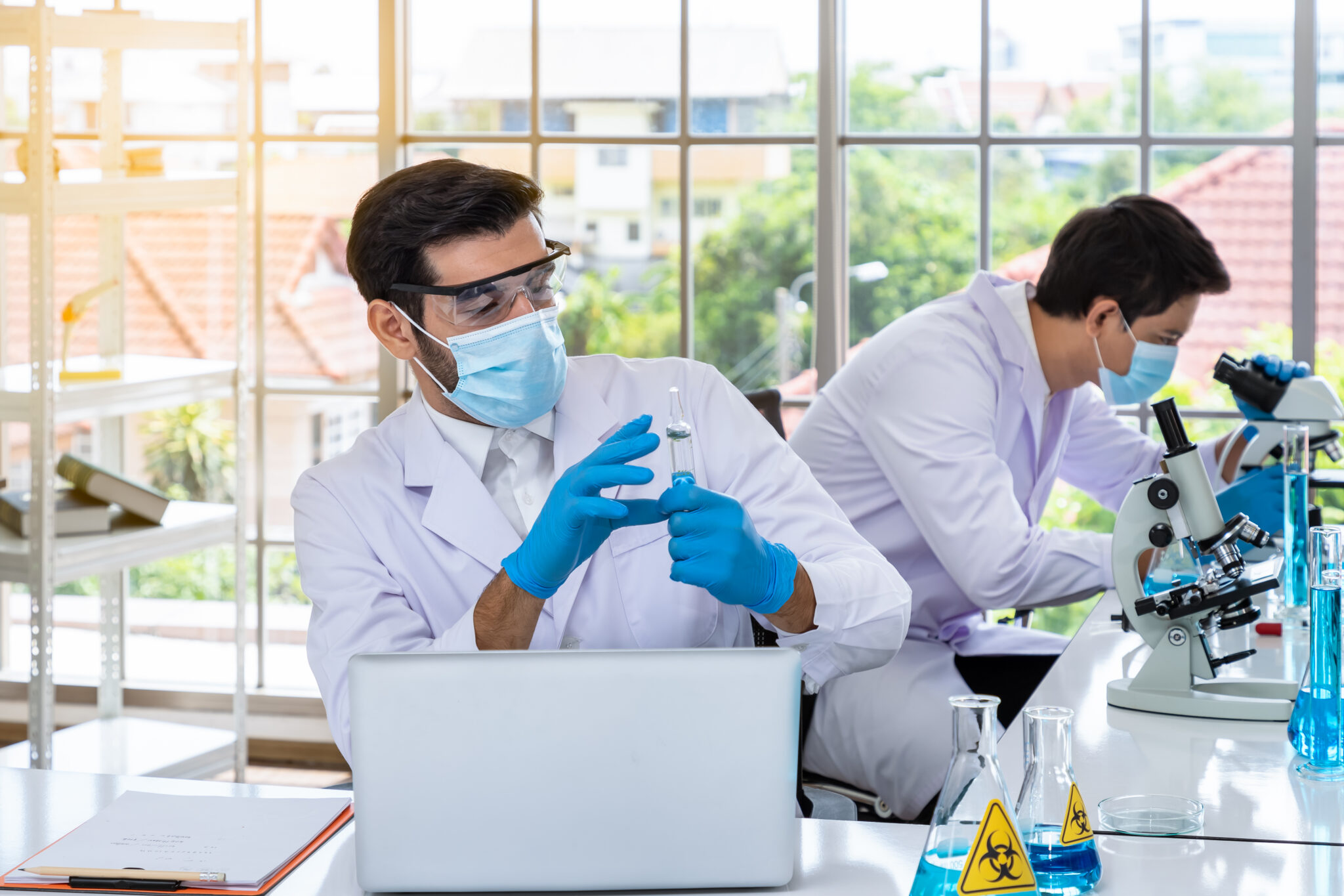 Researchers working in laboratory